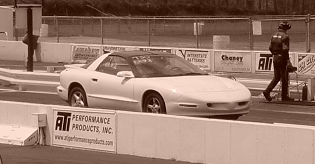 That's me Bracket Racing at MIR 2003, during the Eastern F-body Association's Spring shootout. Pretty much stock with a 13.42 dial-in on real street tires.